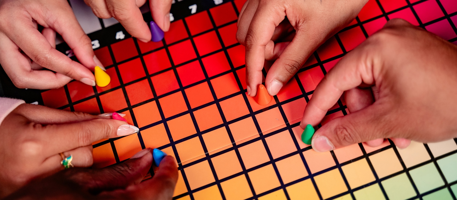 A closeup from people playing Hues and Cues the board game