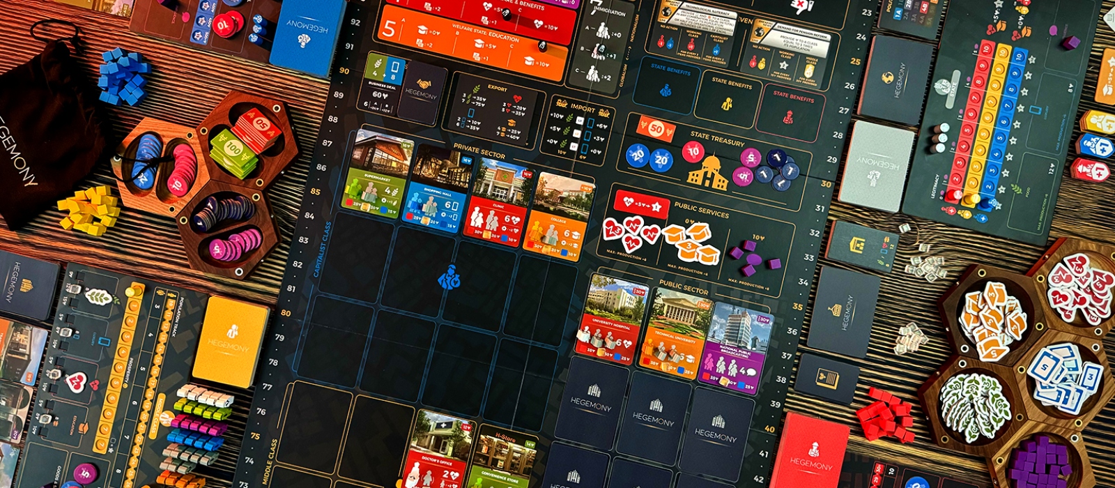 Close-up of Hegemony: Lead Your Class to Victory board game, featuring game board, cards, tokens, token bag, and player boards.
